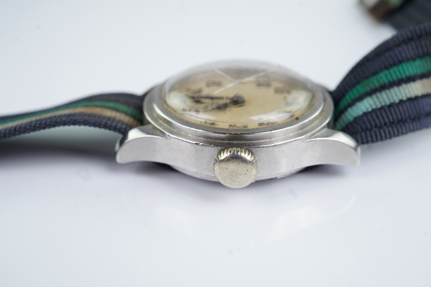 A gentleman's 1940's steel military Longines manual wind wrist watch